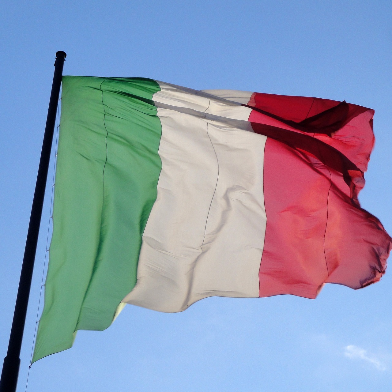 vhs Italian Flag of Italy with vertical stripes in green, white and red, waving in the wind.