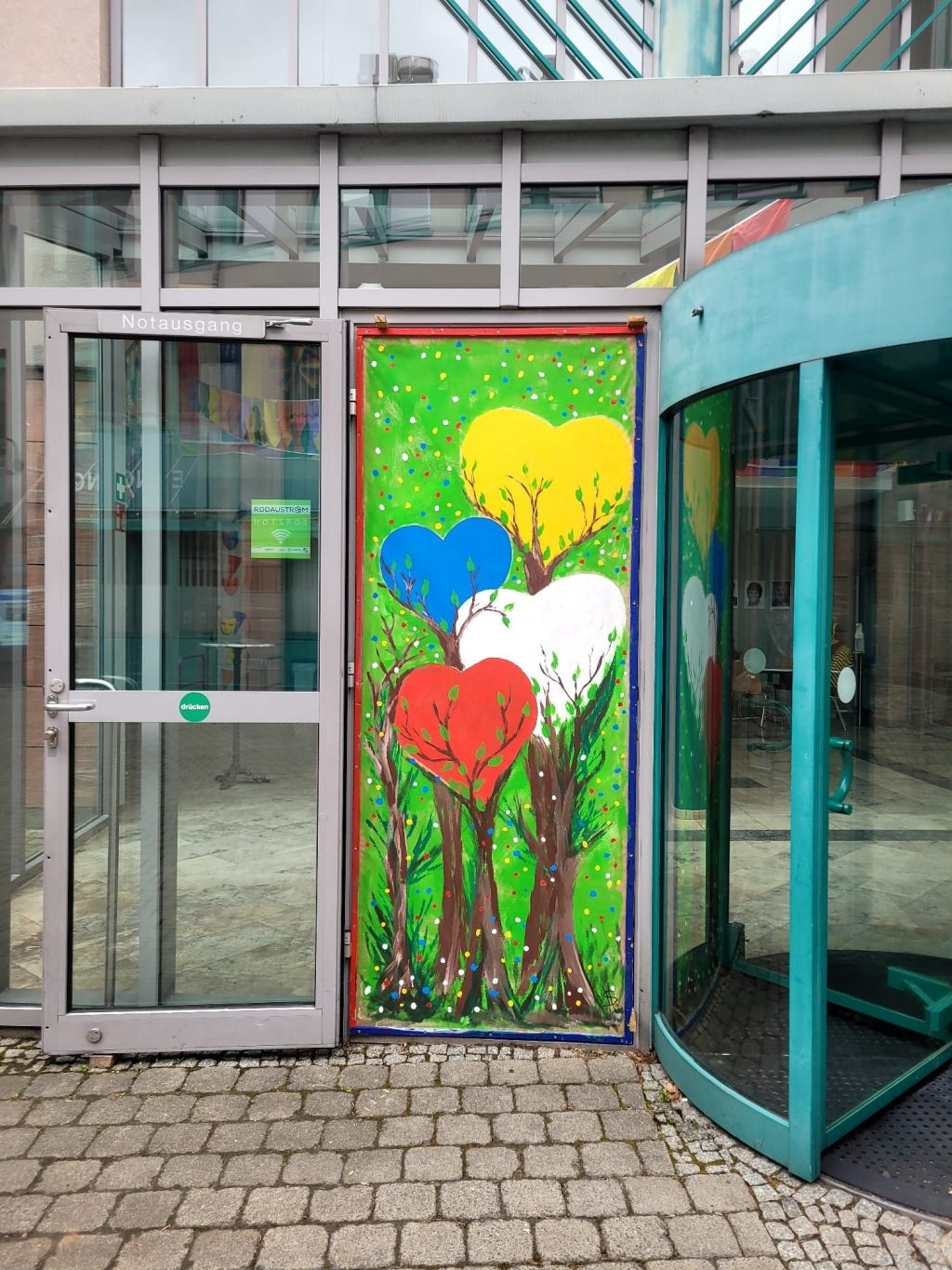 Entrance area of the town hall with the beautifully designed "paper door" through which the town hall is stormed
