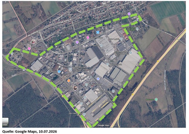 Zona industrială Nieder-Roden – Test de fum și ceață Vedere aeriană a unei zone industriale, delimitată de o linie punctată verde, înconjurată de câmpuri și pădure