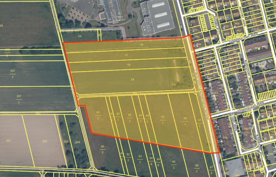 Luftaufnahme eines Gebiets mit gelben Parzellengrenzen und einem rot markierten Bereich, der den Bebauungsplan D 32 in Dudenhofen zeigt